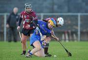 6 December 2009; Mairead Morrissey, Cashel, in action against Regina Glynn, right, and Katherine Glynn, Athenry. All-Ireland Senior Camogie Club Championship Final, Athenry, Galway v Cashel, Tipperary, Clarecastle GAA Club, Clarecastle, Co. Clare. Picture credit: Diarmuid Greene / SPORTSFILE