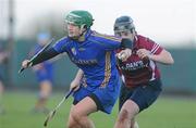6 December 2009; Julie McGrath, Cashel, in action against Katie O'Dwyer, Athenry. All-Ireland Senior Camogie Club Championship Final, Athenry, Galway v Cashel, Tipperary, Clarecastle GAA Club, Clarecastle, Co. Clare. Picture credit: Diarmuid Greene / SPORTSFILE