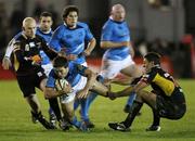 6 December 2009; Eoin O'Malley, Leinster, is tackled by James Arlidge, Dragons. Celtic League, Dragons v Leinster. Rodney Parade, Newport, Wales. Picture credit: Steve Pope / SPORTSFILE