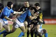 6 December 2009; Rhodri Gomer Davies, Dragons, is tackled by Eoin O'Malley, Leinster. Celtic League, Dragons v Leinster. Rodney Parade, Newport, Wales. Picture credit: Steve Pope / SPORTSFILE