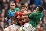 7 February 2016; Justin Tipuric, Wales, is tackled by Jamie Heaslip, left, and CJ Stander, Ireland. RBS Six Nations Rugby Championship 2016, Ireland v Wales. Aviva Stadium, Lansdowne Road, Dublin.  Picture credit: Ramsey Cardy / SPORTSFILE