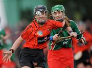 6 December 2009; Mary O'Kane, Lavey, goes past Lorena Mooney, St Anne's Dunhill, on the way to scoring her side's first goal. All-Ireland Junior Camogie Club Championship Final, Lavey, Derry v St Anne's Dunhill, Waterford, Donaghmore Ashbourne, Co. Meath. Picture credit: Brian Lawless / SPORTSFILE