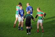 6 December 2009; Referee Maurice Condon shakes hands with players ahead of the game. AIB GAA Football Munster Club Senior Championship Final, Kilmurray Ibrickane, Clare, v Kerins O'Rahilly's, Kerry. Gaelic Grounds, Limerick. Picture credit: Stephen McCarthy / SPORTSFILE