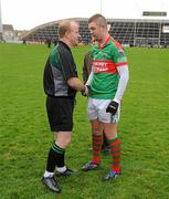 6 December 2009; Enda Coughlan, Kilmurray Ibrickane, shakes hands with referee Maurice Condon before the game. AIB GAA Football Munster Club Senior Championship Final, Kilmurray Ibrickane, Clare, v Kerins O'Rahilly's, Kerry. Gaelic Grounds, Limerick. Picture credit: Pat Murphy / SPORTSFILE