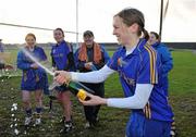6 December 2009; Cashel captain Una Dwyer celebrates with team-mates after victory over Athenry. All-Ireland Senior Camogie Club Championship Final, Athenry, Galway v Cashel, Tipperary, Clarecastle GAA Club, Clarecastle, Co. Clare. Picture credit: Diarmuid Greene / SPORTSFILE