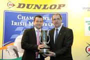 8 December 2009; Eddie Peterson is presented with the Hewison Trophy as National Autotest Champion for 08/09 by John Naylor, President of Motorsport Ireland, during the Dunlop Champions of Irish Motorsport Awards Lunch 2009. Dunlop Champions of Irish Motorsport Awards Lunch 2009, The Crowne Plaza Hotel, Santry, Dublin. Picture credit: Pat Murphy / SPORTSFILE