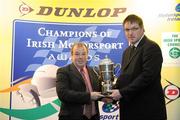 8 December 2009; Noel Carey, left, collects the King Hussein of Jordan Trophy on behalf of John Norris who is the National Karting Champion, from Garry Manning, Chairman of Motorsport Ireland Kart Race Committee, during the Dunlop Champions of Irish Motorsport Awards Lunch 2009. Dunlop Champions of Irish Motorsport Awards Lunch 2009, The Crowne Plaza Hotel, Santry, Dublin. Picture credit: Pat Murphy / SPORTSFILE
