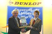 8 December 2009; Jack Lyons is presented with the Neil Shanahan Memorial Trophy as National Junior Kart Champion by Liam Shanahan during the Dunlop Champions of Irish Motorsport Awards Lunch 2009. Dunlop Champions of Irish Motorsport Awards Lunch 2009, The Crowne Plaza Hotel, Santry, Dublin. Picture credit: Pat Murphy / SPORTSFILE