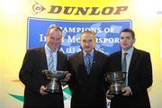 8 December 2009; Arthur Kierans, left, receives the National Navigation Trial Champions Driver award, while Ashley McAdoo, right, is presented with the National Navigation Trial Champion Navigator 08/09 award by Joe Corcoran, Vice President of Motorsport Ireland, during the Dunlop Champions of Irish Motorsport Awards Lunch 2009. Dunlop Champions of Irish Motorsport Awards Lunch 2009, The Crowne Plaza Hotel, Santry, Dublin. Picture credit: Pat Murphy / SPORTSFILE