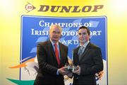 8 December 2009; Patrick McKenna is presented with the Dunlop Sexton Trophy as Young Racing Driver of the Year, by Richard Warbrick, Dunlop, during the Dunlop Champions of Irish Motorsport Awards Lunch 2009. Dunlop Champions of Irish Motorsport Awards Lunch 2009, The Crowne Plaza Hotel, Santry, Dublin. Picture credit: Pat Murphy / SPORTSFILE