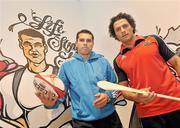 8 December 2009; Lifestyle Sports, Ireland’s biggest player in sport this Christmas, unveiled it's latest store on Patrick Street in Cork City earlier today. Pictured are Cork hurling star Seán Óg Ó hAilpín and Munster’s Doug Howlett in front of a specially commissioned Graffiti Mural of themselves which was erected in front of the store during the weekend. Patrick Street, Cork. Picture credit: Brian Lawless / SPORTSFILE