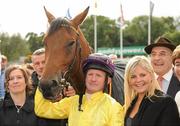 5 September 2009; Jockey Mick Kinane with winning connections and trainer John Oxx, right, after Sea The Stars had won the Tattersalls Millions Irish Champion Stakes. Leopardstown Racecourse, Dublin. Picture credit: Ray McManus / SPORTSFILE