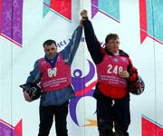 11 March 2001; Silver Medal winner Cormac Maguire, left, from Balinteer in Dublin, salutes the Gold medal winner, Chris Fronk, USA, at the presentations for the Division M07 Novice Slalom Final  at the 2001 Special Olympics World Winter Games at the Alyeska Ski Resort in Anchorage, Alaska, USA. Photo by Sinéad McManus/Sportsfile