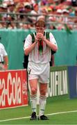 24 June 1994; Steve Staunton of Republic of Ireland drinks from a water bag during the FIFA World Cup 1994 Group E match between Mexico and Republic of Ireland at the Citrus Bowl in Orlando, Florida, USA. Photo by David Maher/Sportsfile