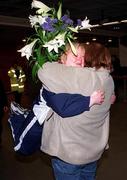13 March 2001; Jacenta O'Neill from Glasnevin in Dublin who brought home a silver medal, gets a big hug from her mother when Ireland's Special Olympics Team from the 2001 Special Olympics World Winter Games in the Alyeska resort in Girdwood, Alaska, USA arrived home at Dublin Airport. Photo by Gerry Barton/Sportsfile