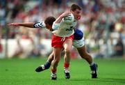 27 September 1998; Brian McGuigan of Tyrone is tackled by Darren Rooney of Laois during the All-Ireland Minor Football Championship Final match between Laois and Tyrone at Croke Park in Dublin. Photo by Matt Browne/Sportsfile