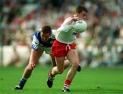 27 September 1998; Brian McGuigan of Tyrone is tackled by Darren Rooney of Laois during the All-Ireland Minor Football Championship Final match between Laois and Tyrone at Croke Park in Dublin. Photo by Matt Browne/Sportsfile