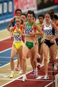 9 March 2001; Sonia O'Sullivan of Ireland, 627, leads Gabriela Szabo of Romania, 700, during the Women's 3000m heats during the World Indoor Athletics Championship at the Atlantic Pavillion in Lisbon, Portugal. Photo by Brendan Moran/Sportsfile