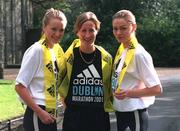 14 March 2001; 1998 London Marathon Champion Catherina McKiernan with models Kelly O'Byrne, left, and Catherine Woods, right, at the announcement that ADIDAS will sponsor the Dublin Marathon for the next 4 years which is worth in excess of £500,000. Photo by Brendan Moran/Sportsfile