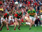 28 September 1997; Darragh Ó Sé of Kerry in action against James Nallen, centre, and Noel Connelly of Mayo during the Bank of Ireland All-Ireland Senior Football Championship Final between Kerry and Mayo at Croke Park in Dublin. Photo by Ray McManus/Sportsfile