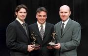 15 March 2001; Seamus Banim of Eircom, centre, presents Liam Kelly of St Patrick's Athletic, left, winner of the eircom / SWAI Player of the Month for February, and Paul Doolin of Shelbourne, who won the award for January, with their awards at a luncheon in Dublin. Photo by Brendan Moran/Sportsfile