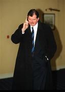 16 March 2001; Bernard O'Byrne, FAI Chief Executive / General Secretary, answers a phone call before the start of the FAI Board of Management meeting at the Ashling Hotel in Dublin. Photo by David Maher/Sportsfile