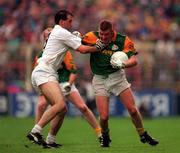 3 August 1997; Tommy Dowd of Meath in action against Glenn Ryan of Kildare during the Leinster GAA Senior Football Championship Semi-Final Second Replay match between Meath and Kildare at Croke Park in Dublin. Photo by Ray McManus/Sportsfile