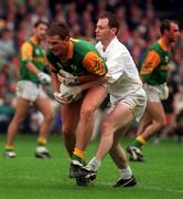 3 August 1997; Darren Fay of Meath is tackled by Declan Kerrigan of Kildare during the Leinster GAA Senior Football Championship Semi-Final Second Replay match between Meath and Kildare at Croke Park in Dublin. Photo by Ray McManus/Sportsfile