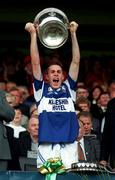 28 September 1997; Laois captain Kieran Kelly lifts the Tom Markham Cup after the All-Ireland Minor Football Championship Final match between Laois and Tyrone at Croke Park in Dublin. Photo by Ray McManus/Sportsfile