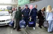 20 March 2001; Roy Keane and team physio Mick Byrne at Dublin Airport as the Republic of Ireland squad depart for Nicosia for their 2002 FIFA World Cup qualifier against Cyprus. Photo by David Maher/Sportsfile