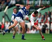 28 September 1997; Darren Rooney of Laois in action against Gary Hetherington of Tyrone during the All-Ireland Minor Football Championship Final match between Laois and Tyrone at Croke Park in Dublin. Photo by Ray McManus/Sportsfile