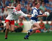 28 September 1997; Brian McDonald of Laois in action against Kevin O'Brien of Tyrone during the All-Ireland Minor Football Championship Final match between Laois and Tyrone at Croke Park in Dublin. Photo by Ray McManus/Sportsfile
