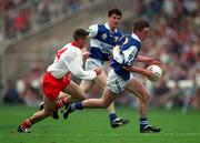 28 September 1997; Kieran Kelly of Laois in action against Brendan Donnelly of Tyrone during the All-Ireland Minor Football Championship Final match between Laois and Tyrone at Croke Park in Dublin. Photo by Ray McManus/Sportsfile