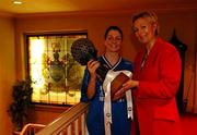 20 March 2001; Waterford Wildcats captain Christine Kiely is presented with the ESB Women's Basketball League title by ESB Sponsorship manager Margaret Kelleher at a Civic Reception at City Hall in Waterford. Photo by Brendan Moran/Sportsfile