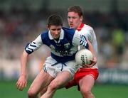 28 September 1997; Michael Lambe of Laois in action against Cormac McAnallen of Tyrone during the All-Ireland Minor Football Championship Final match between Laois and Tyrone at Croke Park in Dublin. Photo by Ray McManus/Sportsfile