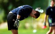 21 March 2001; Shay Given cools himself down with water during a Republic of Ireland training session in Limassol, Cyprus. Photo by Damien Eagers/Sportsfile