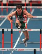 9 March 2001; Peter Coghlan of Ireland competing in the Men's 60m Hurdles during the World Indoor Athletics Championship at the Atlantic Pavillion in Lisbon, Portugal. Photo by Brendan Moran/Sportsfile
