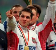 11 March 2001; Piotr Rysivkiewicz of Poland celebrates with his Gold medal after the Mens 4x400m Final during the World Indoor Athletics Championship at the Atlantic Pavillion in Lisbon, Portugal. Photo by Brendan Moran/Sportsfile