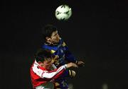 23 March 2001; Alan Murphy of Longford Town in action against Martin Russell of St Patrick's Athletic during the FAI Harp Lager Cup Third Round Replay match between St Patrick's Athletic and Longford Town at Richmond Park in Dublin. Photo by Matt Browne/Sportsfile