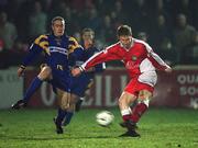 23 March 2001; Robert Griffin of St Patrick's Athletic in action against Shay Zellor of Longford Town during the FAI Harp Lager Cup Third Round Replay match between St Patrick's Athletic and Longford Town at Richmond Park in Dublin. Photo by Matt Browne/Sportsfile