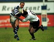 24 March 2001; Ryan Constable of Dungannon is tackled by John Kelly of Cork Constitution during the AIB All-Ireland League Division 1 match between Dungannon RFC and Cork Constitution RFC at Dungannon RFC in Tyrone. Photo by Matt Browne/Sportsfile