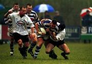 24 March 2001; Justin Fitzpatrick of Dungannon is tackled by Craig Taylor of Cork Constitution during the AIB All-Ireland League Division 1 match between Dungannon RFC and Cork Constitution RFC at Dungannon RFC in Tyrone. Photo by Matt Browne/Sportsfile