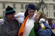 25 March 2001; Keith Kelly of Ireland with his parents Paul and Kathleen after competing in the Senior Men's Long race at the IAAF World Cross Country Championships at the Wellington Hippodroom in Ostend, Belgium. Photo by Ray McManus/Sportsfile
