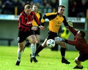 25 March 2001; Glen Crowe of Bohemians goes around the Kilkenny City goalkeeper Matt Nelson to score his side's first goal during the FAI Harp Larger Cup Quarter-Final match between Kilkenny City and Bohemians at Buckley Park in Kilkenny. Photo by Matt Browne/Sportsfile