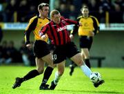 25 March 2001; Glen Crowe of Bohemians goes past the tackle of David Mulcahy of Kilkenny City to score his side's first goal during the FAI Harp Larger Cup Quarter-Final match between Kilkenny City and Bohemians at Buckley Park in Kilkenny. Photo by Matt Browne/Sportsfile