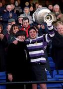 25 March 2001; Terenure College captain Donal Dunlop lifts the cup alongside his mother after the Leinster Schools Schools Cup Final match between Blackrock College and Terenure College at Landowne Road in Dublin. Photo by Aoife Rice/Sportsfile