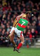 25 March 2001; Johnny Dooley of Seir Kieran in action against Niall Claffey of Birr during the Offaly County Senior Hurling Championship Final match between Birr and Seir Kieran at St Brendan's Park in Birr, Offaly. Photo by Brendan Moran/Sportsfile