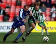 25 March 2001; Paddy McGrenaghan of Finn Harps in action against Stephen Gifford of Bray Wanderers during the Eircom League Premier Division match between Bray Wanderers and Finn Harps at the Carlisle Grounds in Bray, Wicklow. Photo by Ray Lohan/Sportsfile