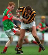 25 March 2001; Barry Whelahan of Birr contests possession against Joe Dooley of Seir Kieran during the Offaly County Senior Hurling Championship Final match between Birr and Seir Kieran at St Brendan's Park in Birr, Offaly. Photo by Brendan Moran/Sportsfile