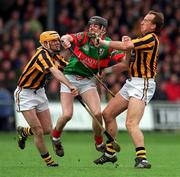 25 March 2001; Rory Hanniffy of Birr is tackled by Damien Murphy, left, and Joe Dooley of Seir Kieran during the Offaly County Senior Hurling Championship Final match between Birr and Seir Kieran at St Brendan's Park in Birr, Offaly. Photo by Pat Murphy/Sportsfile